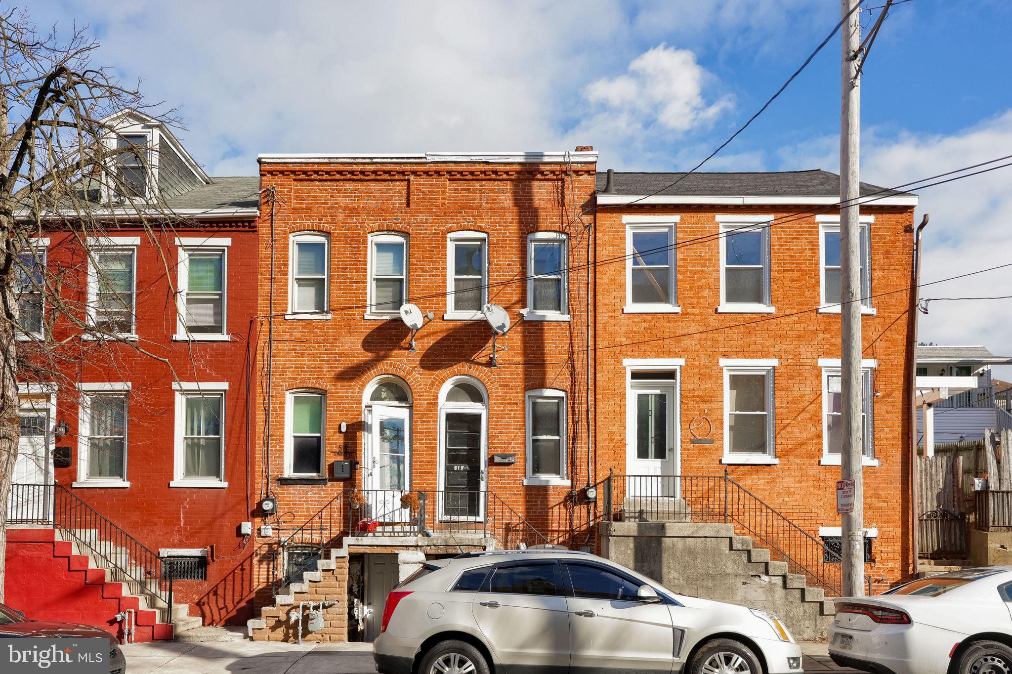 a car parked in front of a building