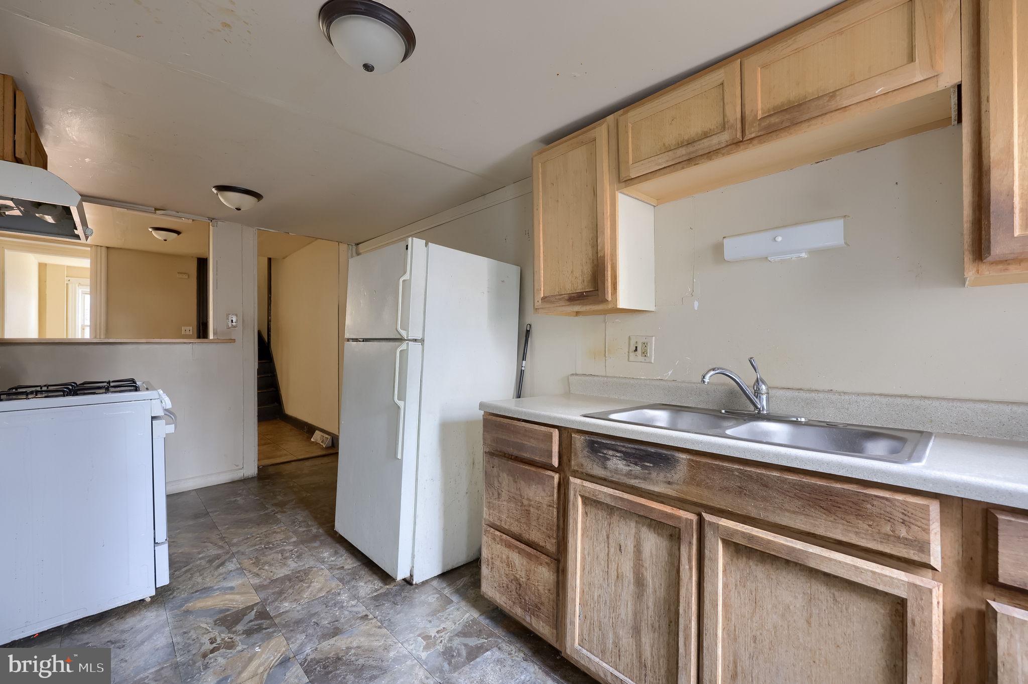 519 South Prince Street Lancaster, PA 17603 - Photo 11 of 15 a kitchen with a sink appliances and cabinets