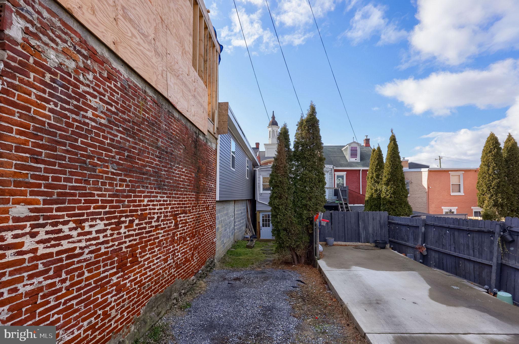 519 South Prince Street Lancaster, PA 17603 - Photo 4 of 15 a pathway of a house with a yard