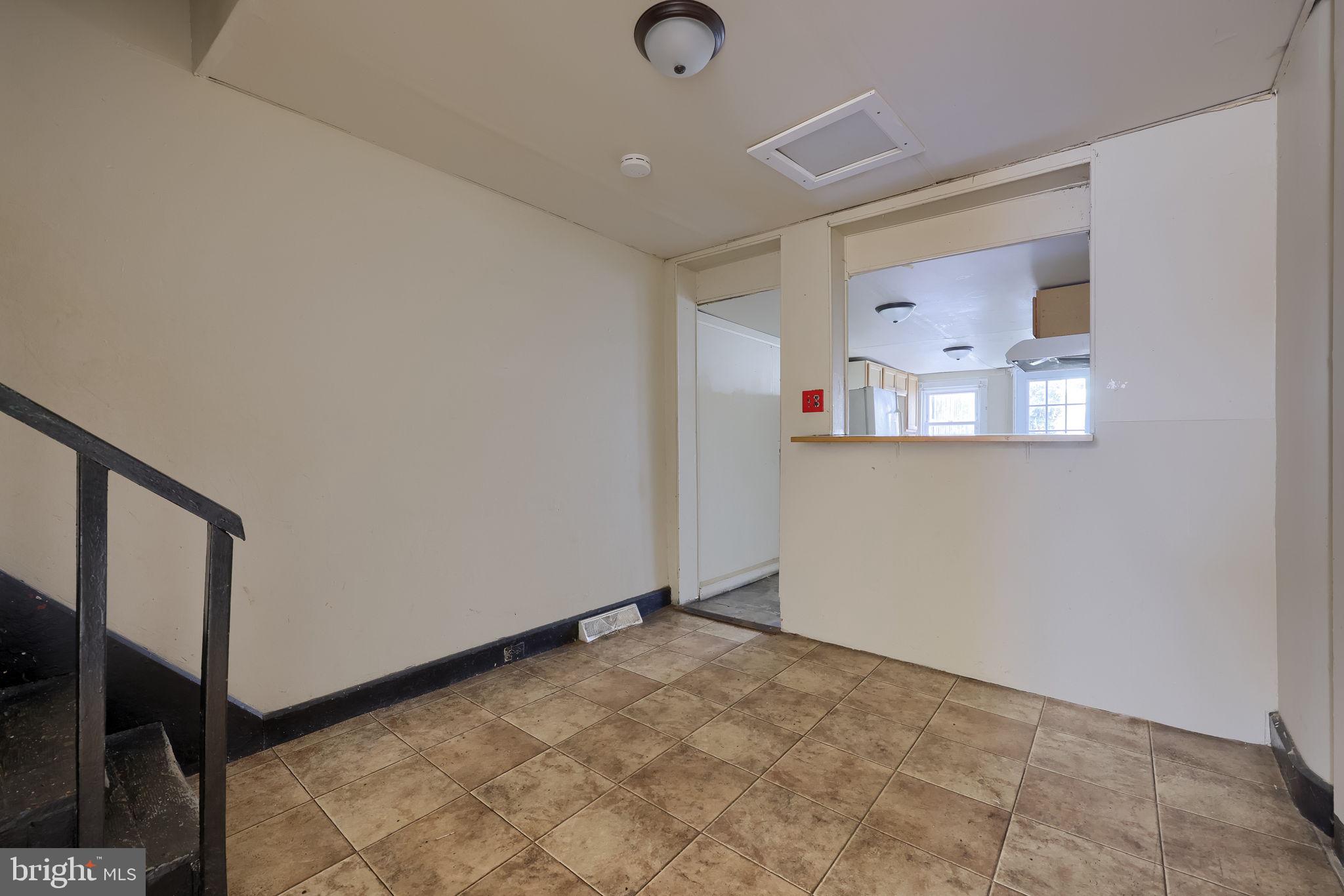 519 South Prince Street Lancaster, PA 17603 - Photo 9 of 15 a view of a livingroom with wooden floor and a window
