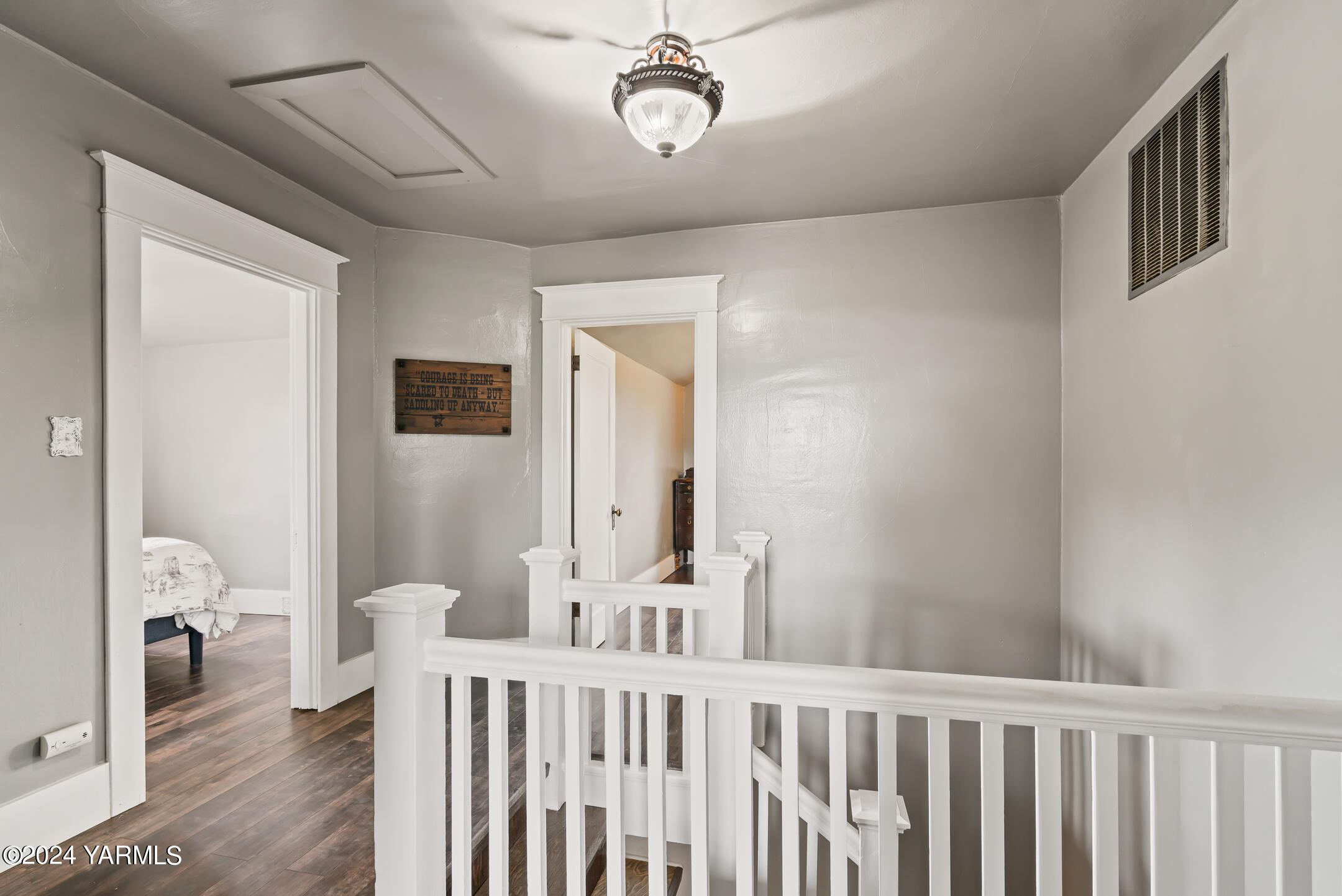 17970 Ahtanum Road Yakima, WA 98903 - Photo 13 of 27 a view of a hallway to a livingroom with furniture