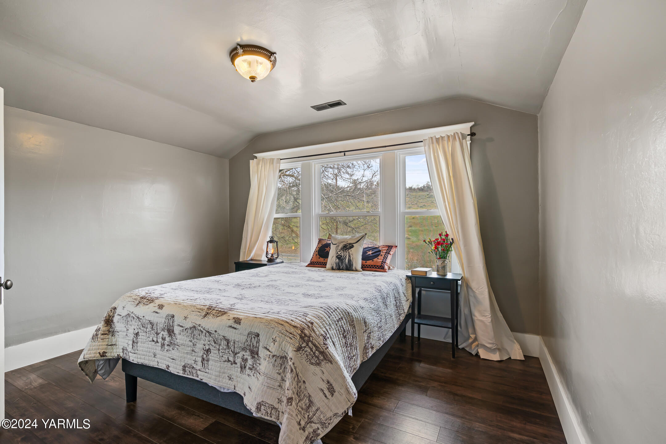 17970 Ahtanum Road Yakima, WA 98903 - Photo 15 of 27 a bedroom with a bed and a window