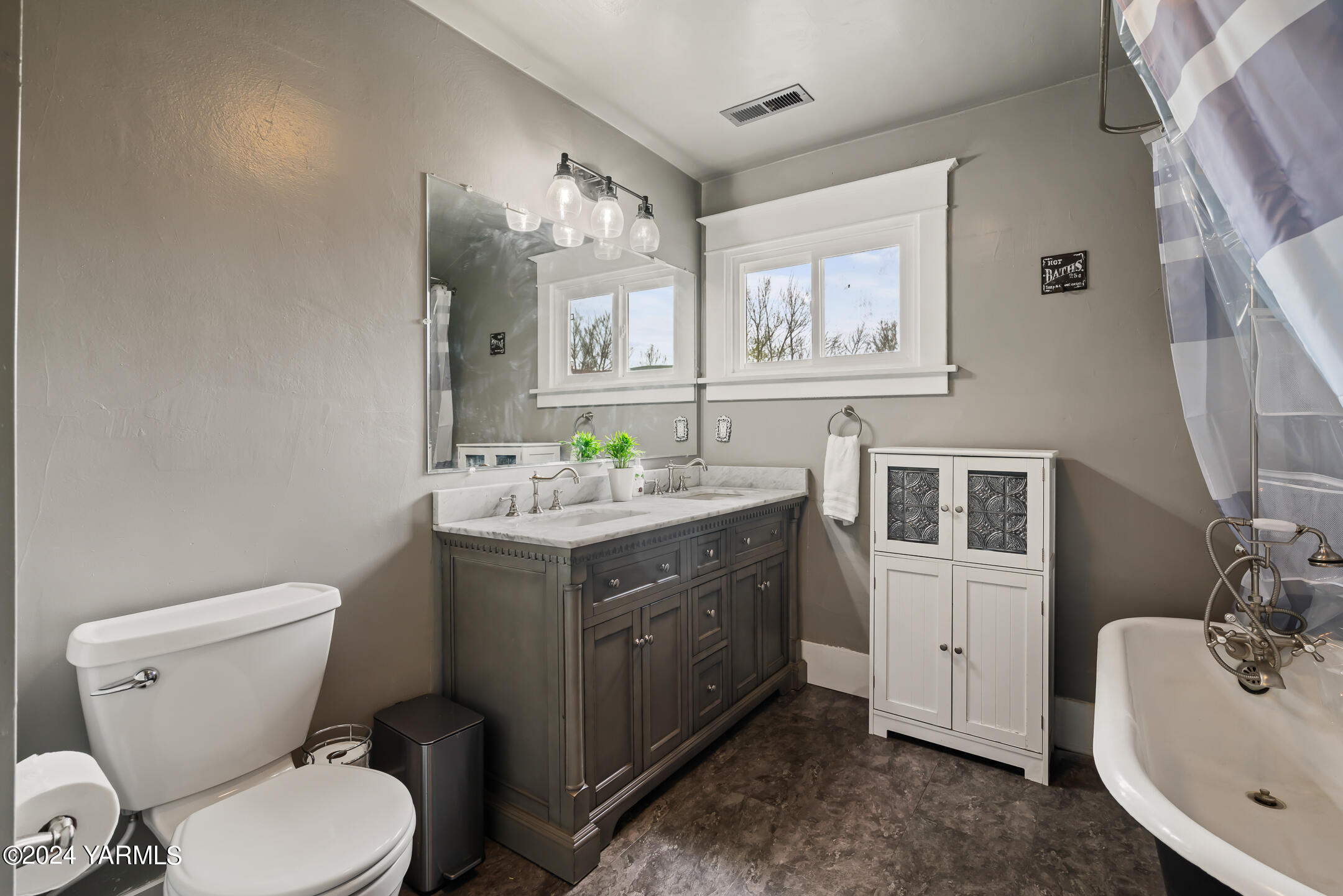 17970 Ahtanum Road Yakima, WA 98903 - Photo 17 of 27 a bathroom with a granite countertop toilet sink and mirror