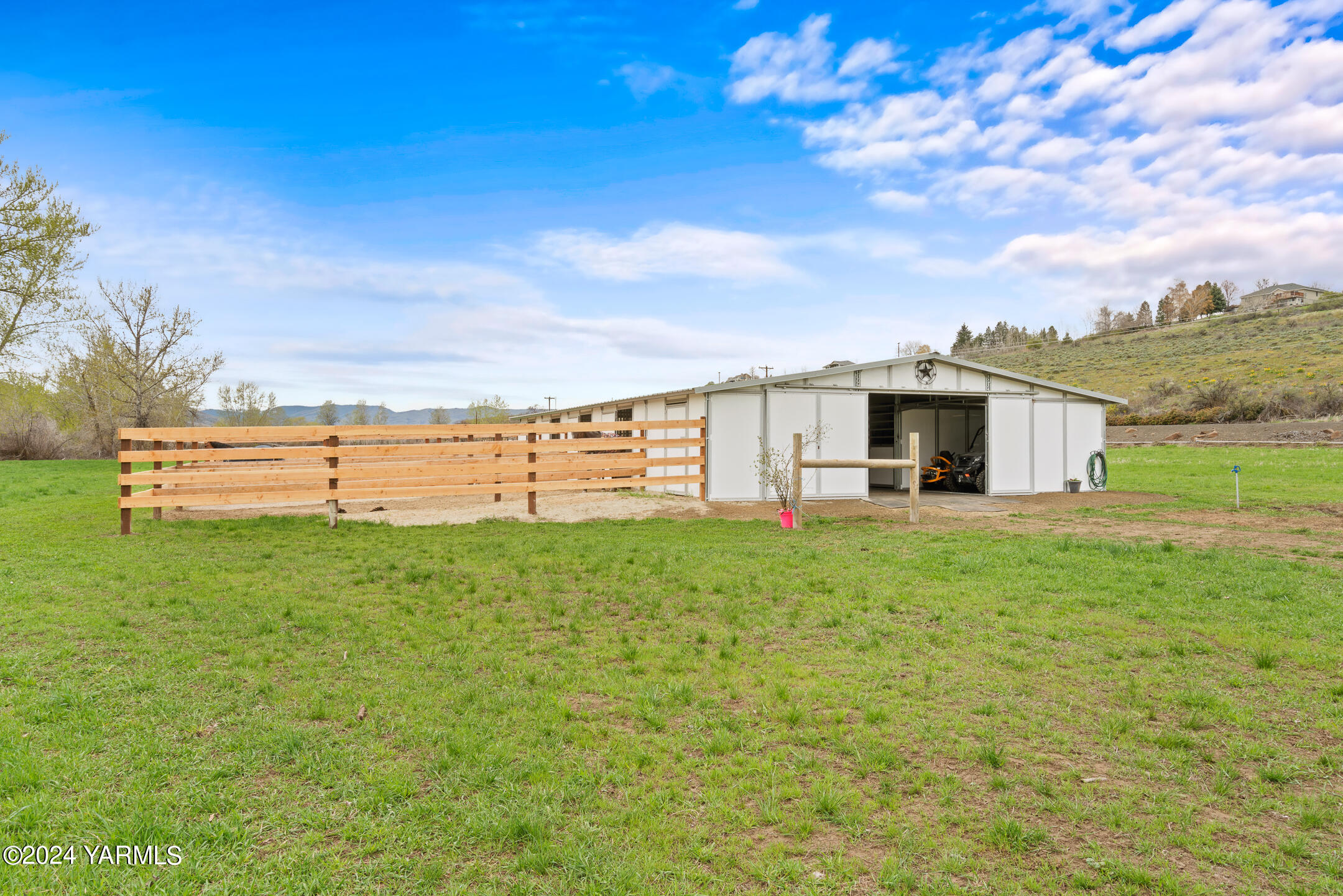 17970 Ahtanum Road Yakima, WA 98903 - Photo 21 of 27 a view of a house with a yard
