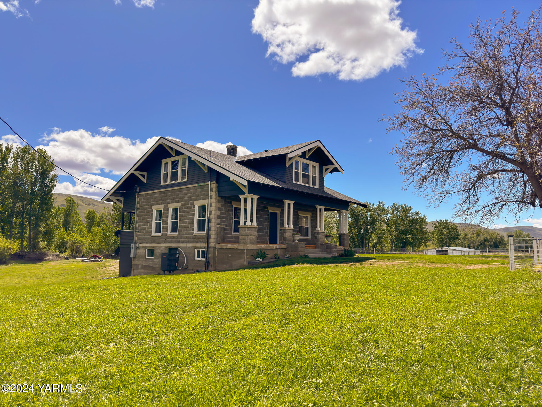 17970 Ahtanum Road Yakima, WA 98903 - Photo 3 of 27 a view of a house with a big yard