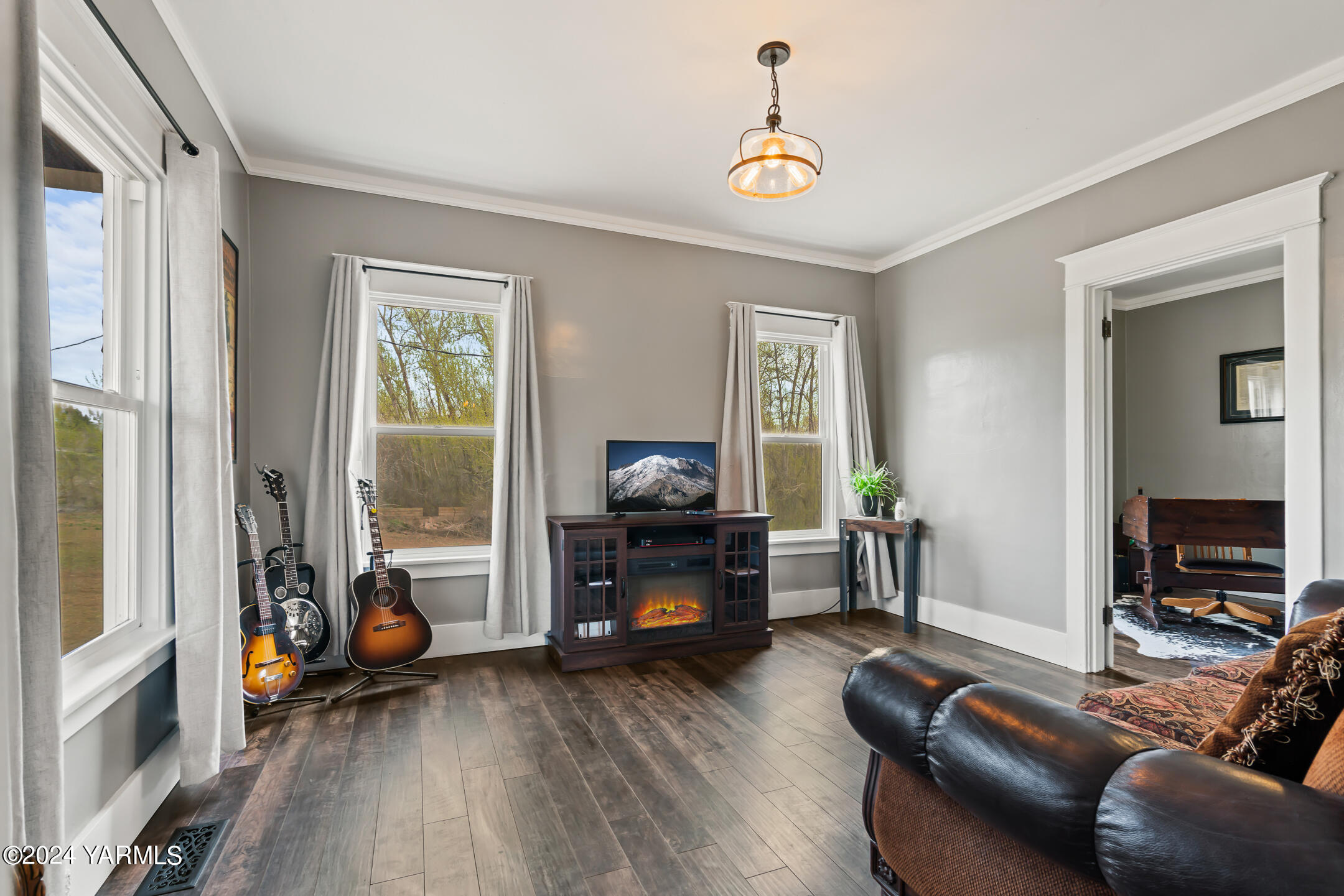 17970 Ahtanum Road Yakima, WA 98903 - Photo 5 of 27 a living room with furniture and a fireplace
