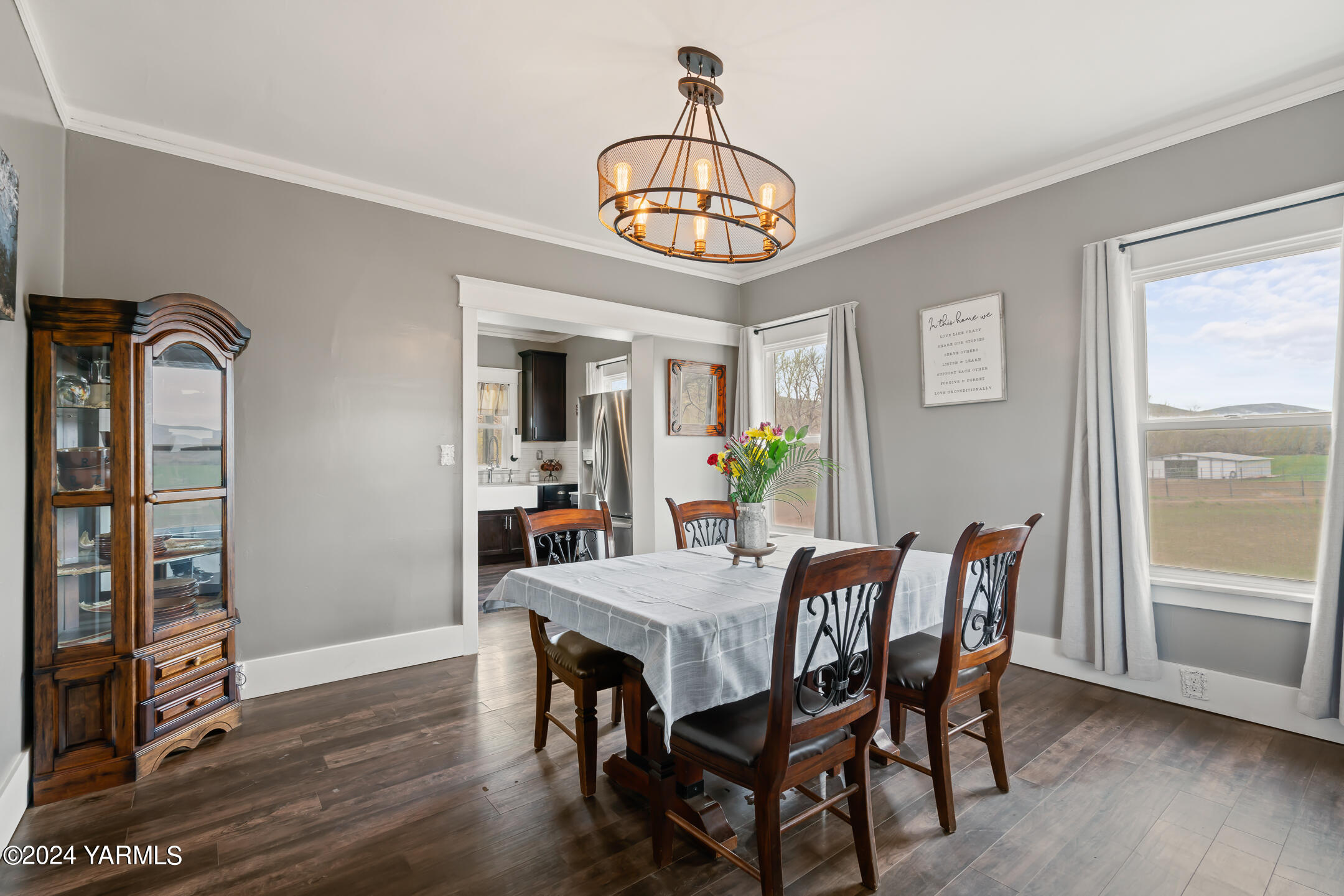 17970 Ahtanum Road Yakima, WA 98903 - Photo 8 of 27 a view of a dining room with furniture window and wooden floor