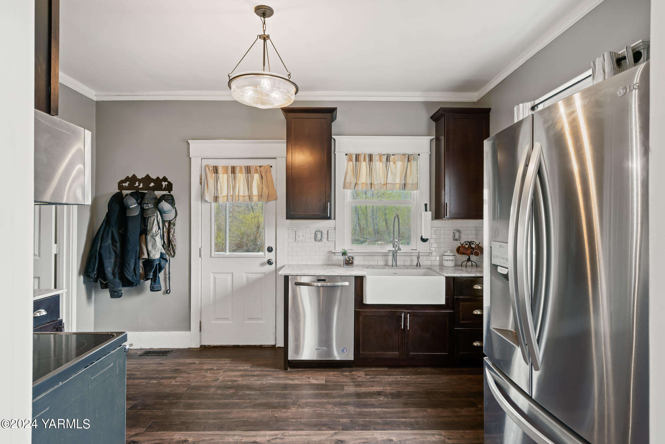 17970 Ahtanum Road Yakima, WA 98903 - Photo 9 of 27 a kitchen with stainless steel appliances a refrigerator and a sink