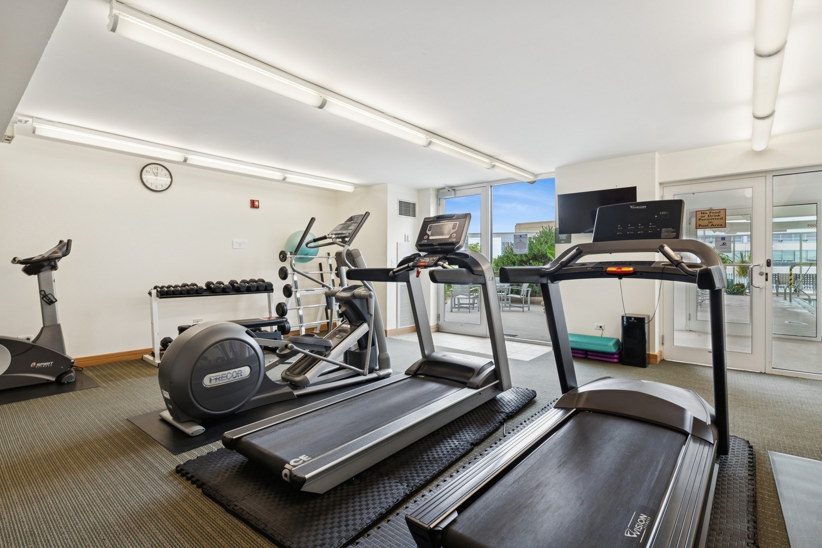 1640 Maple Avenue, Unit 1202 Evanston, IL 60201 - Photo 14 of 19 a view of a room with gym equipment