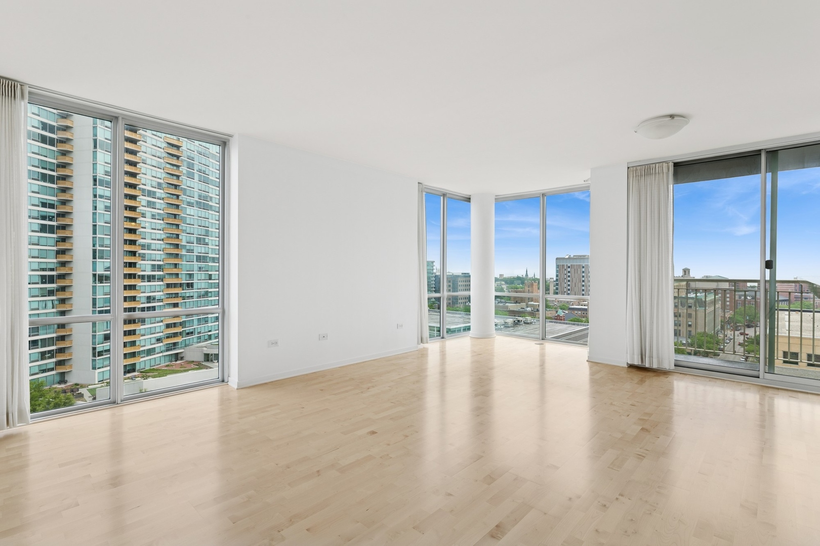 1640 Maple Avenue, Unit 1202 Evanston, IL 60201 - Photo 2 of 18 wooden floor in an empty room with a window