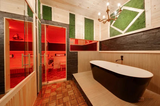 a bathroom with a bathtub and a shower