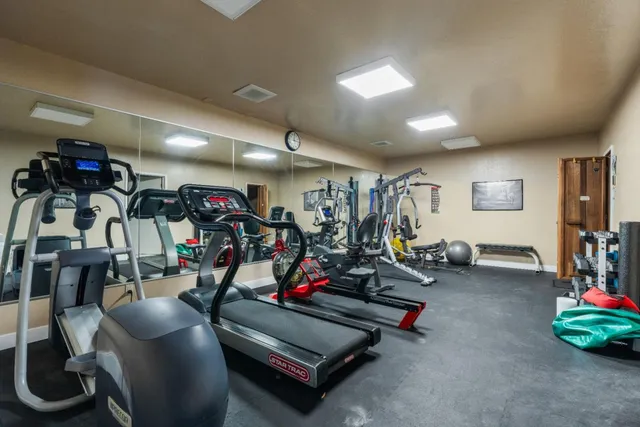 a view of a room with gym equipment