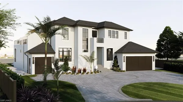 an aerial view of a house with yard and patio