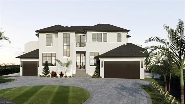 a front view of a house with lots of trees