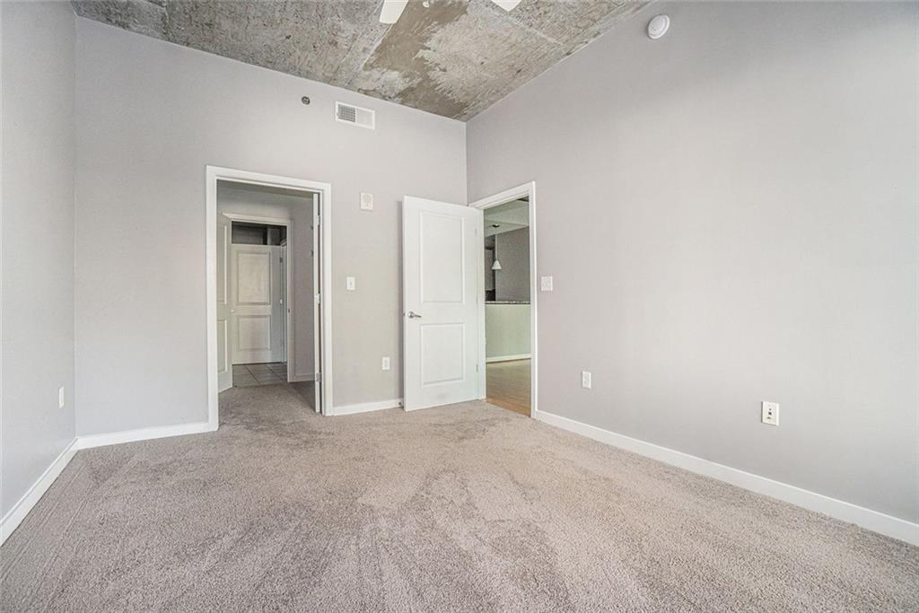 250 Pharr Road Northeast, Unit 405 Atlanta, GA 30305 - Photo 13 of 20 a view of an empty room