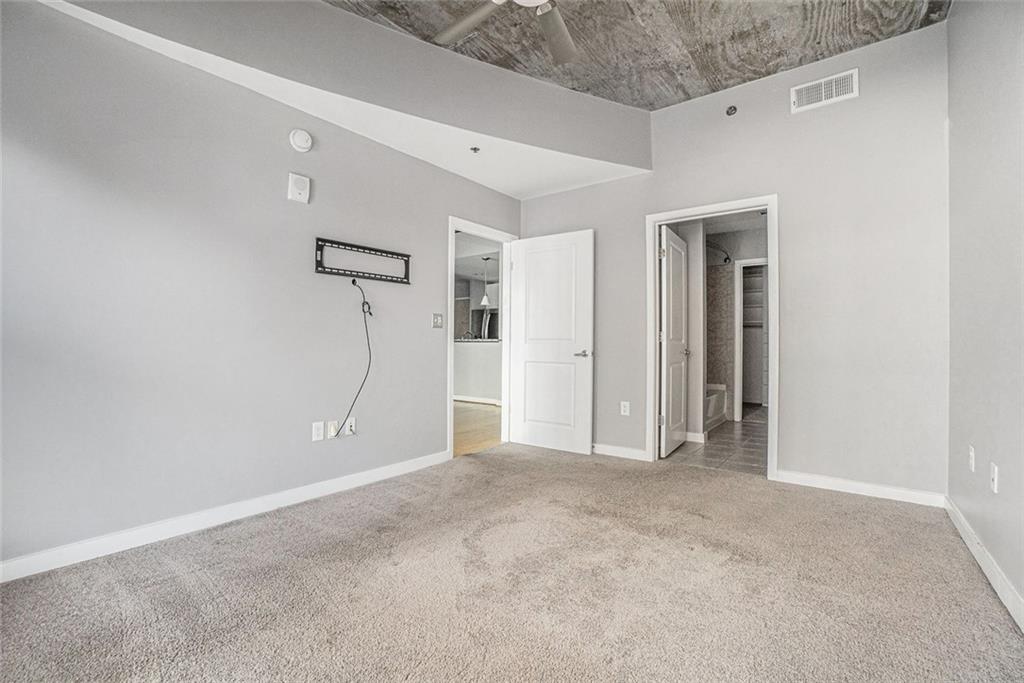 250 Pharr Road Northeast, Unit 405 Atlanta, GA 30305 - Photo 7 of 20 a view of an empty room