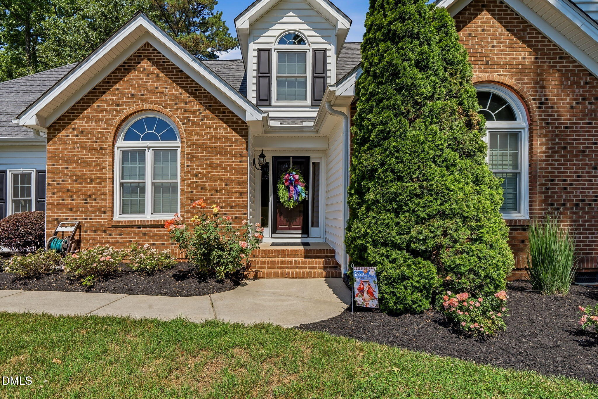 1112 Tyler Farms Drive Raleigh, NC 27603 - Photo 6 of 78 a front view of a house with a yard