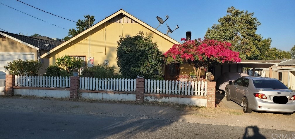 4977 Tulsa Avenue Riverside, CA 92505 - Photo 1 of 1 a view of a house and a yard