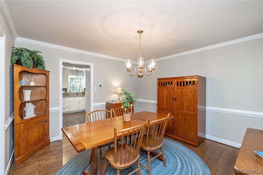 13821 Shadow Ridge Road Midlothian, VA 23112 - Photo 11 of 50 a view of a dining room with furniture wooden floor and chandelier