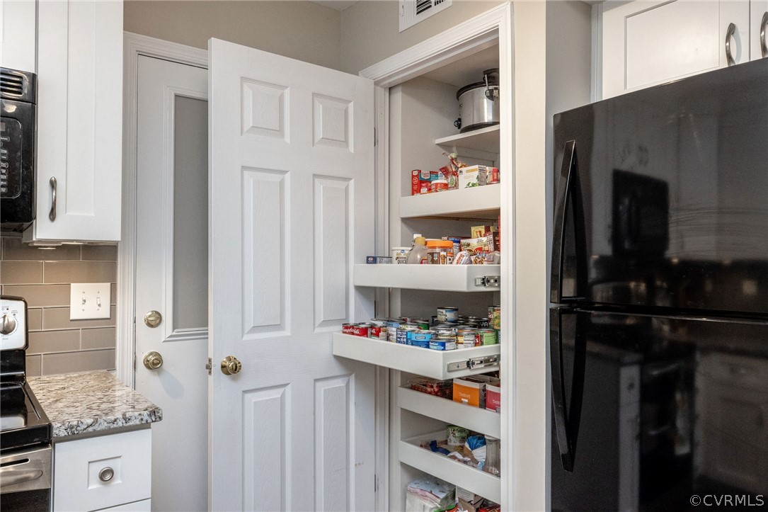 13821 Shadow Ridge Road Midlothian, VA 23112 - Photo 19 of 50 a room with storage and utility