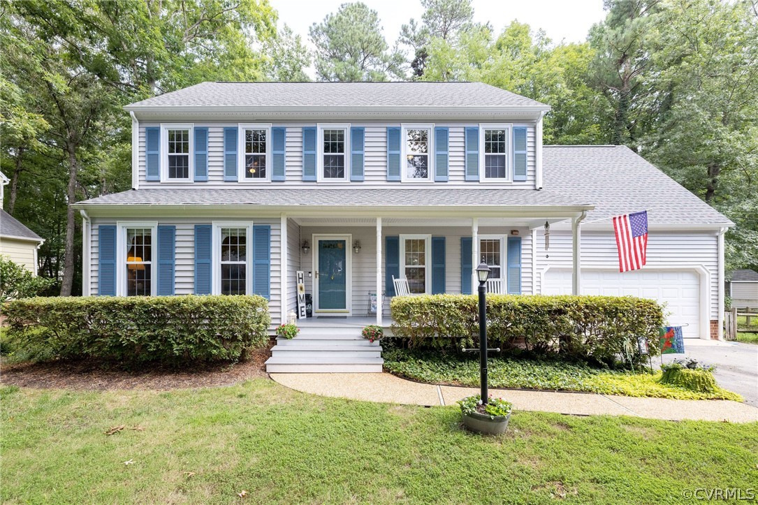 13821 Shadow Ridge Road Midlothian, VA 23112 - Photo 3 of 50 a house with yard in front of it