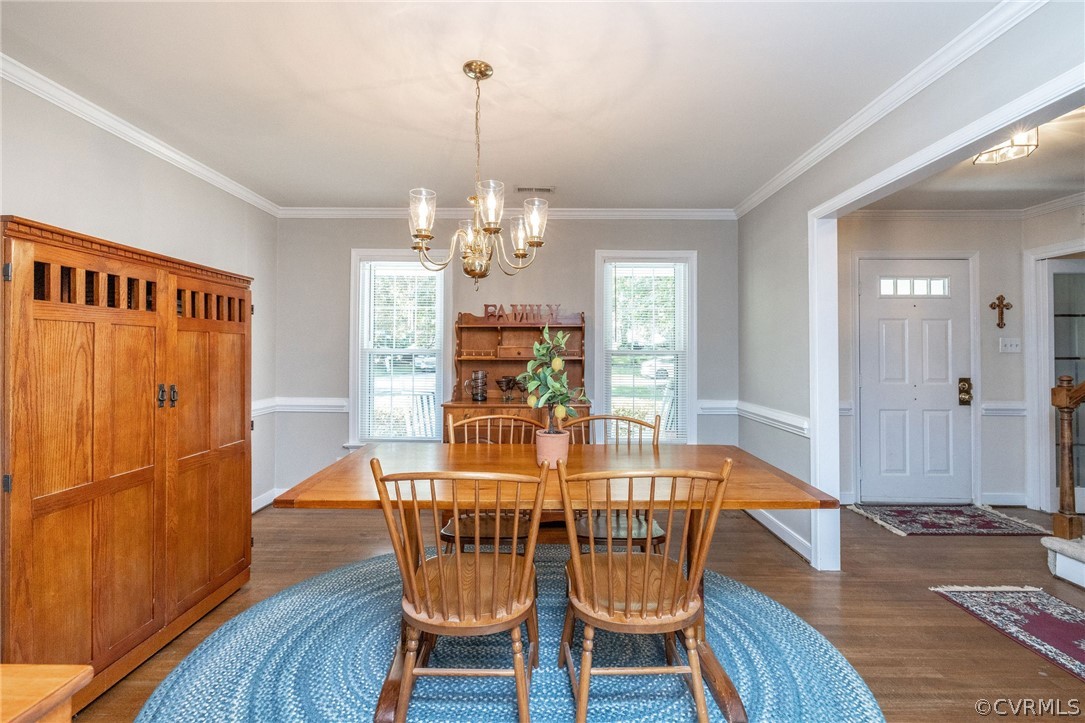 13821 Shadow Ridge Road Midlothian, VA 23112 - Photo 10 of 50 a view of a dining room with furniture window and wooden floor