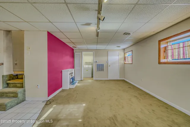 a view of a room with an empty space