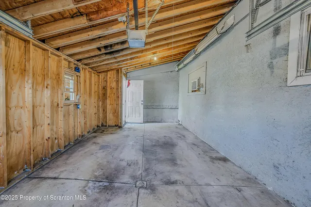a utility room with stainless steel appliances