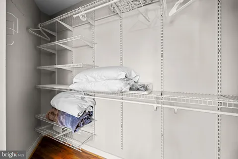 a room with cabinets and appliances