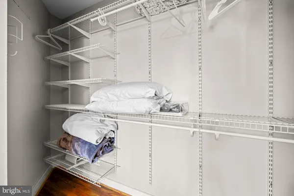 a room with cabinets and appliances
