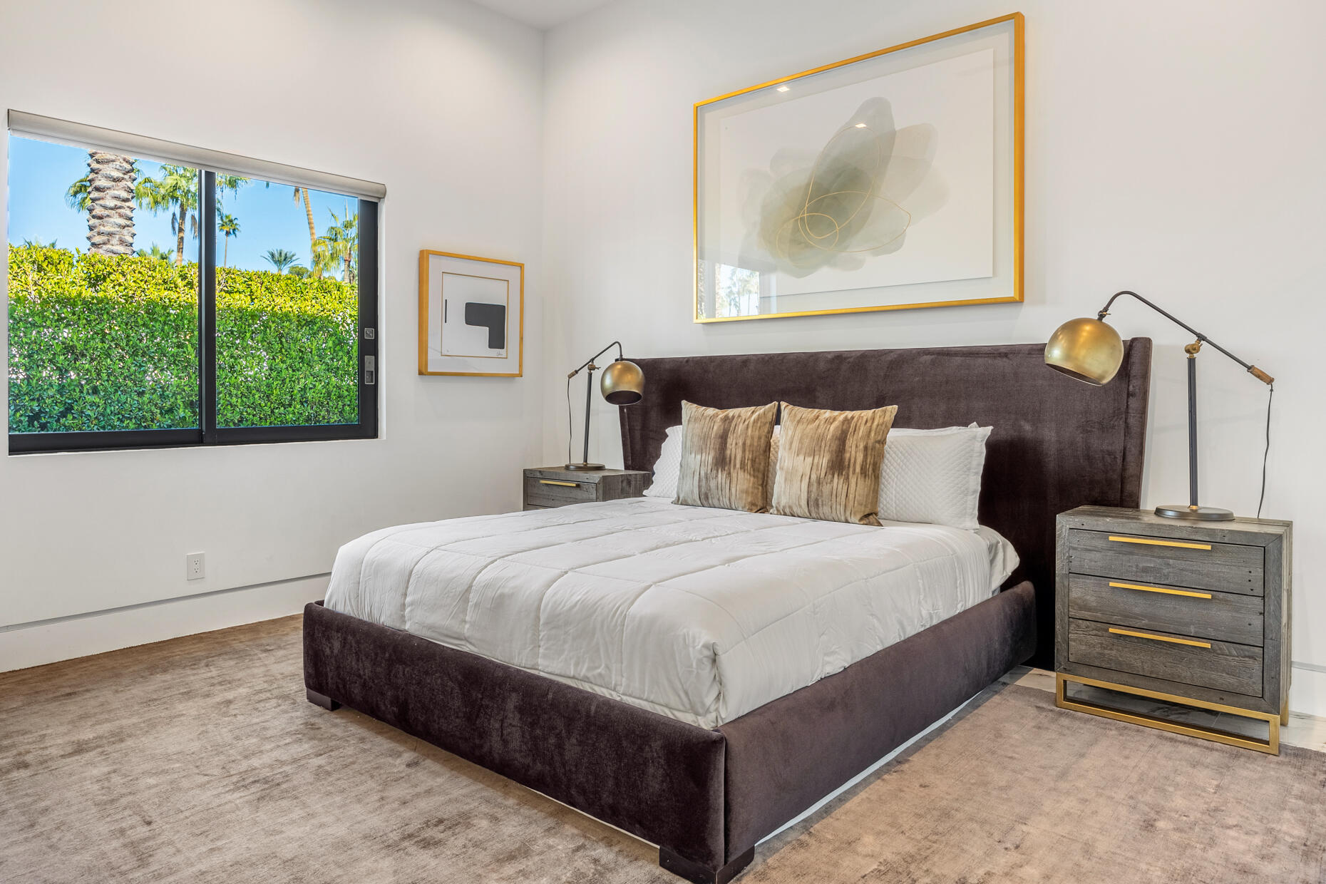 2 Bravo Court Rancho Mirage, CA 92270 - Photo 18 of 34 a bedroom with a bed and window