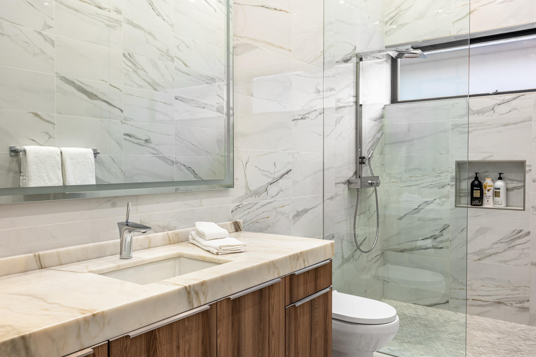 2 Bravo Court Rancho Mirage, CA 92270 - Photo 23 of 34 a bathroom with a sink toilet and shower