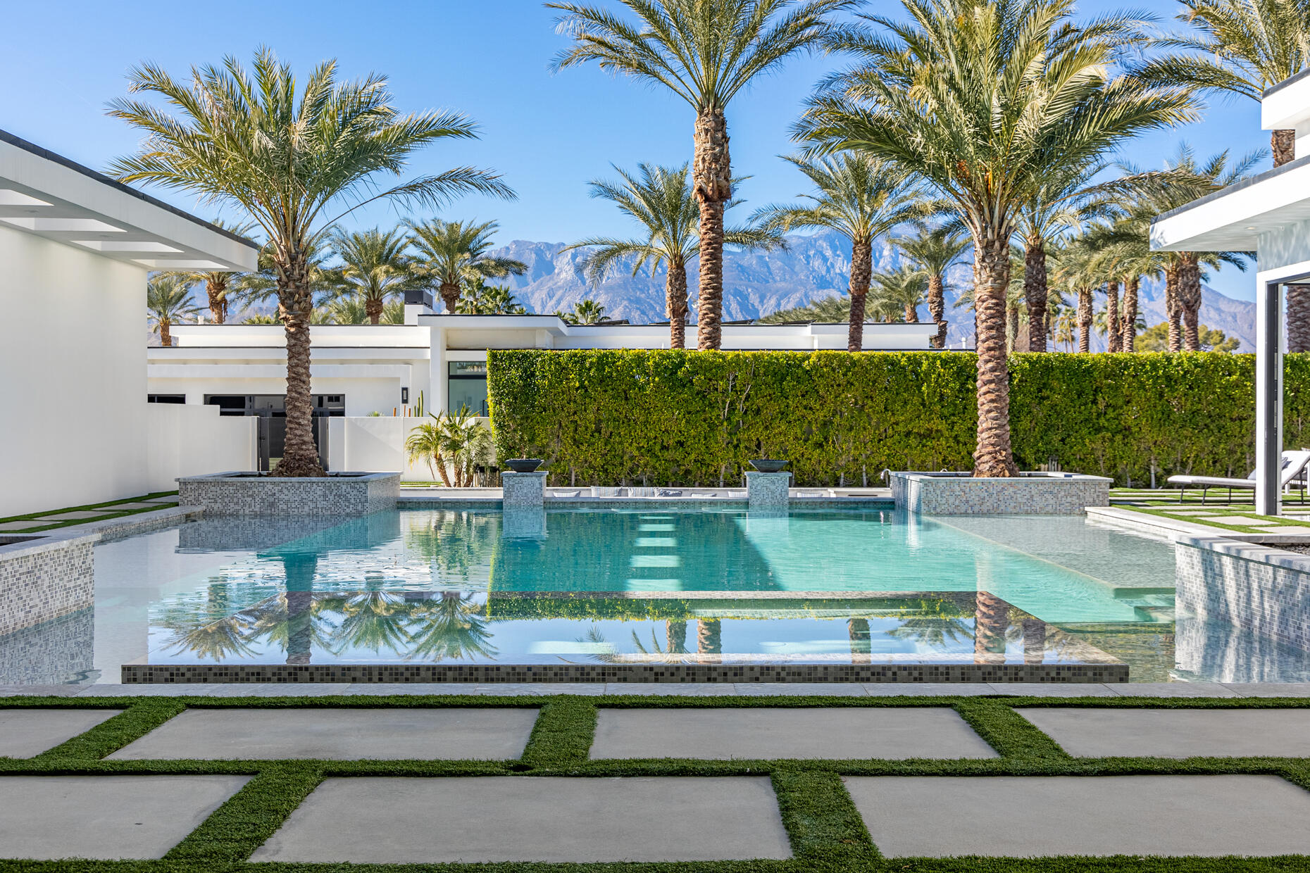 2 Bravo Court Rancho Mirage, CA 92270 - Photo 8 of 34 a view of a yard and front view of a house
