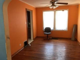 10641 South Sangamon Street Chicago, IL 60643 - Photo 12 of 16 a view of a livingroom with wooden floor and a window