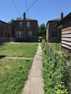 10641 South Sangamon Street Chicago, IL 60643 - Photo 16 of 16 a view of a house with a small yard and a large window