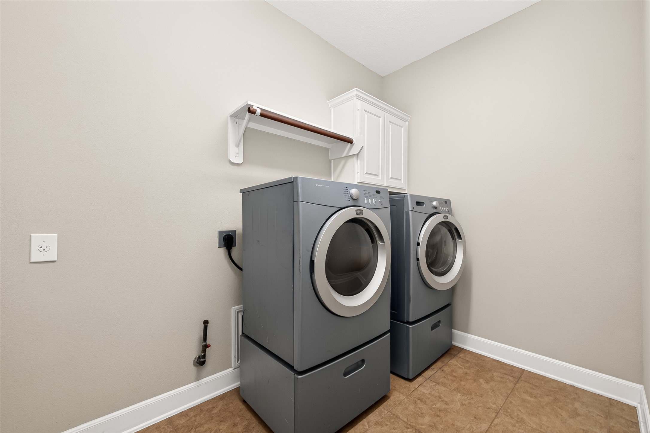 2310 Spring Lake Park Lane Spring, TX 77386 - Photo 24 of 47 a utility room with dryer and washer