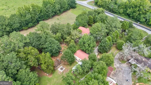 a view of swimming pool with a yard