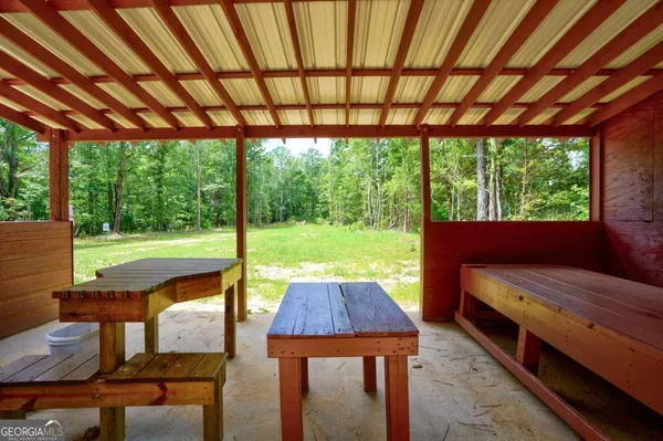 a sign of golf club on a wall