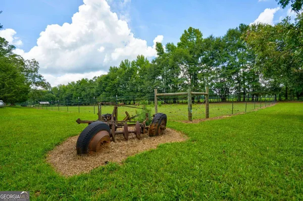 a view of a golf course with a lake