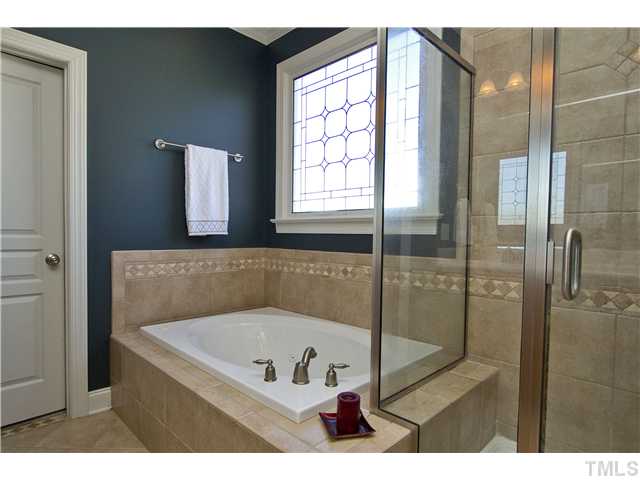8717 Oregon Inlet Court Raleigh, NC 27603 - Photo 15 of 25 Nice bench in the shower too.....every shower should have a bench!