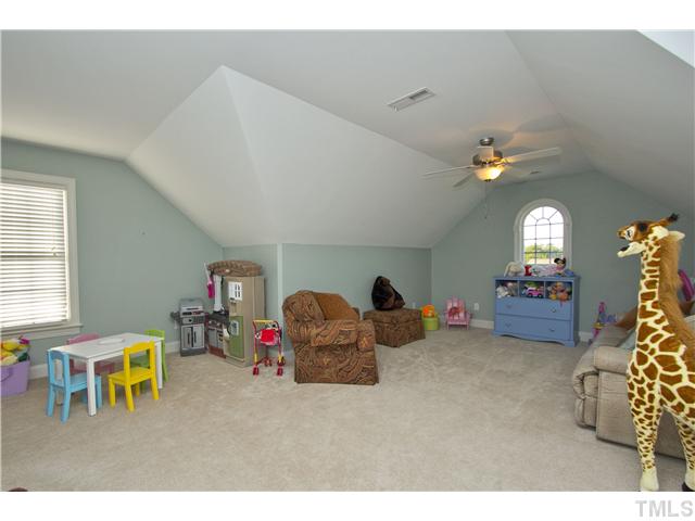 8717 Oregon Inlet Court Raleigh, NC 27603 - Photo 17 of 25 Large enough to be divided into play area for adults and play area for kids! Another bed could also fit in this space and still have extra play room!