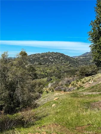a view of mountain view with mountains in the background