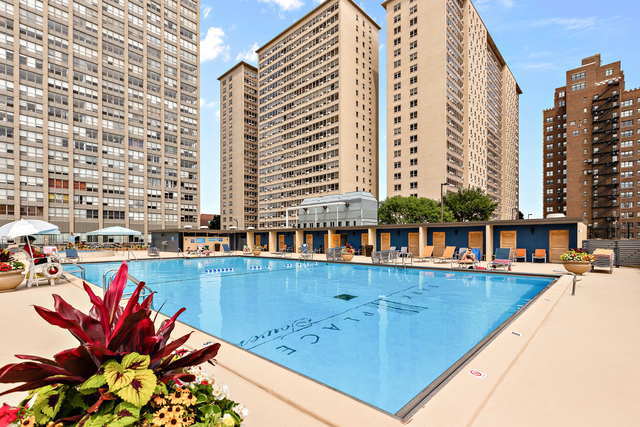 655 West Irving Park Road, Unit 5413 Chicago, IL 60613 - Photo 17 of 23 a view of swimming pool with outdoor seating
