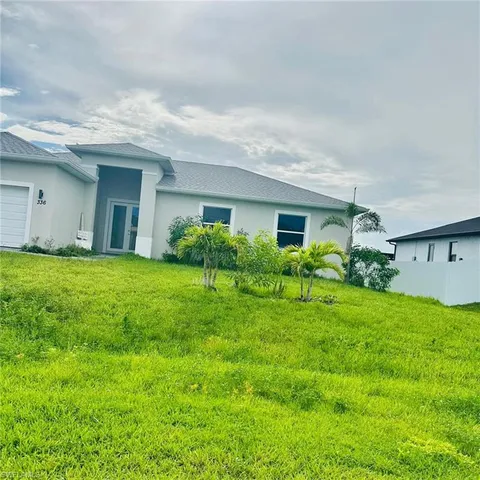 a house view with a garden space