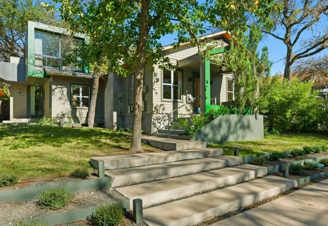 front view of a house with a yard