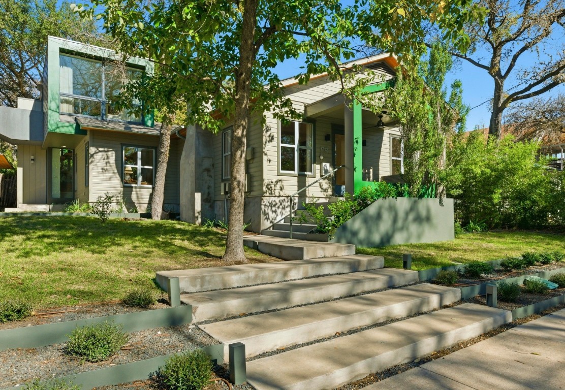 front view of a house with a yard