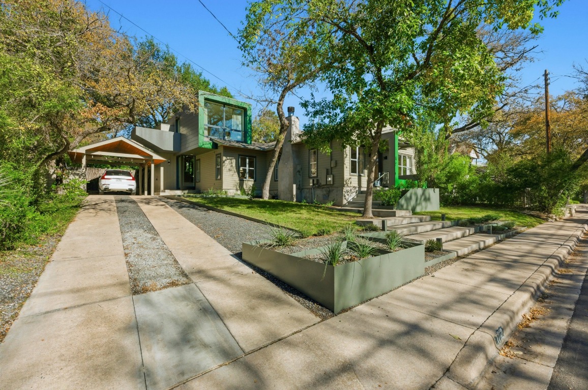 1712 West 10th Street Austin, TX 78703 - Photo 2 of 34 a view of a house with backyard and sitting area