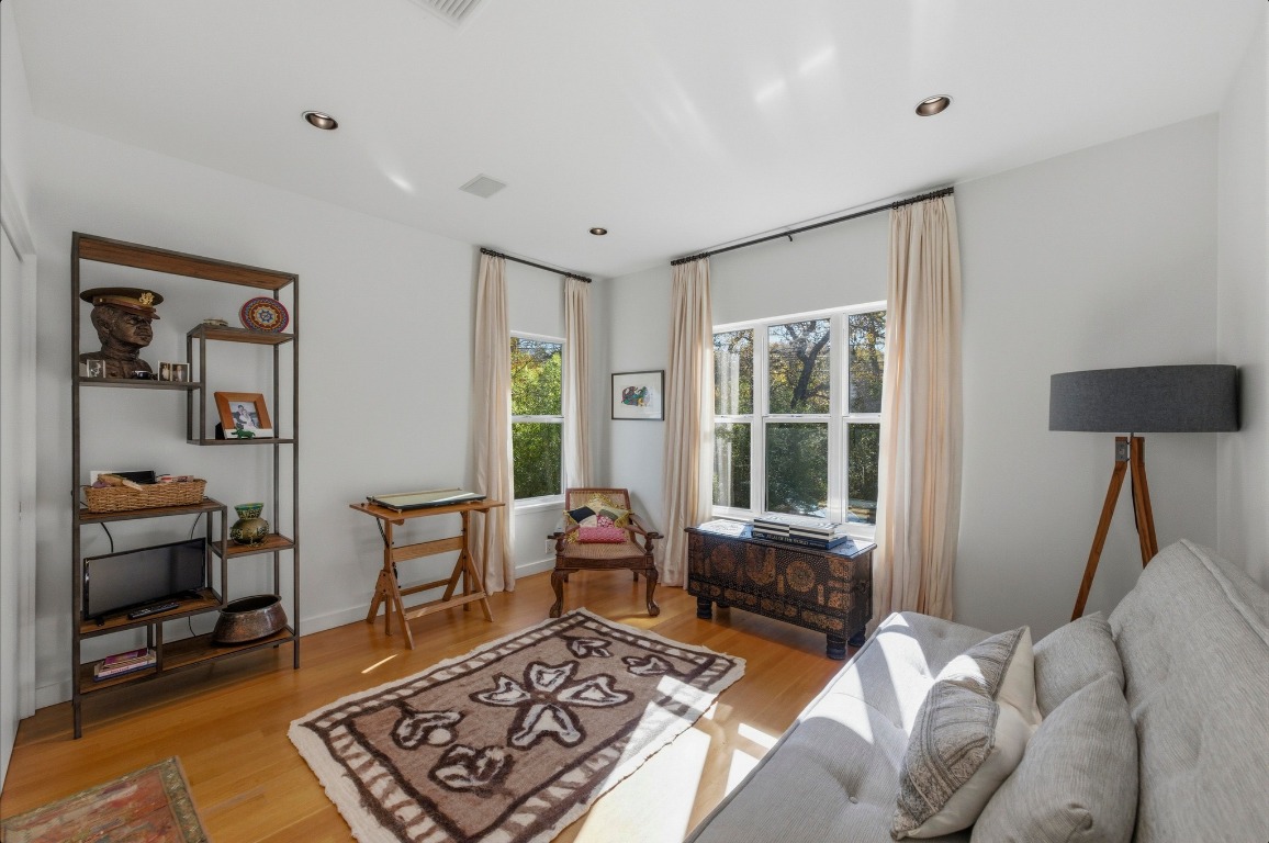 1712 West 10th Street Austin, TX 78703 - Photo 27 of 34 a bed room with furniture and a window