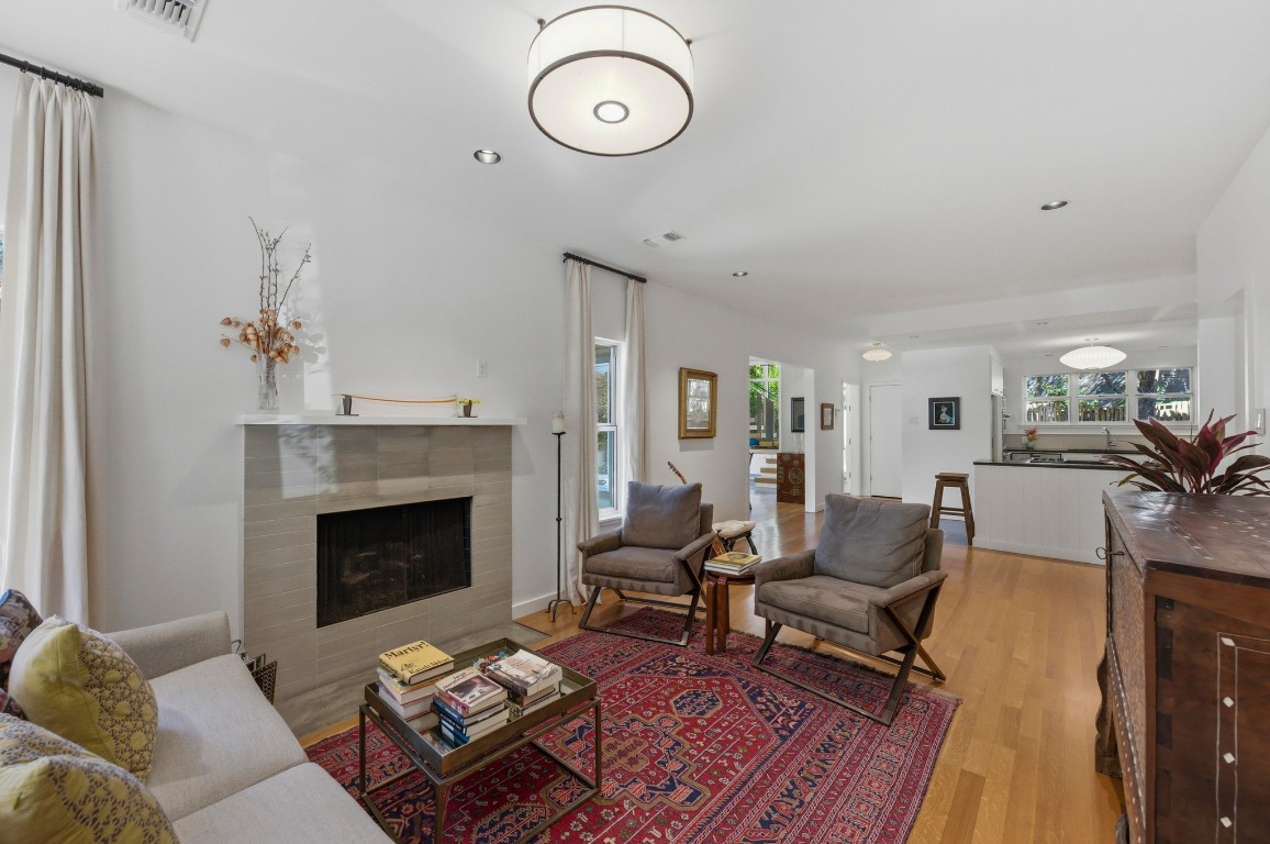 1712 West 10th Street Austin, TX 78703 - Photo 4 of 34 a living room with furniture fireplace and rug