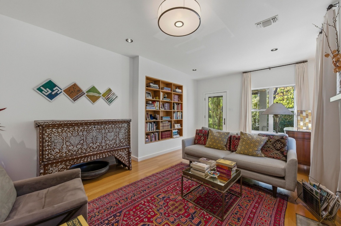1712 West 10th Street Austin, TX 78703 - Photo 6 of 34 a living room with furniture a rug and a window
